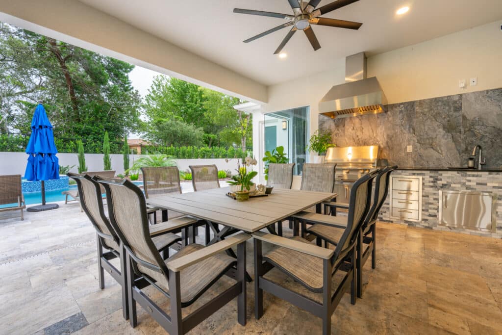 Elegant outdoor dining area with a large table and comfortable seating