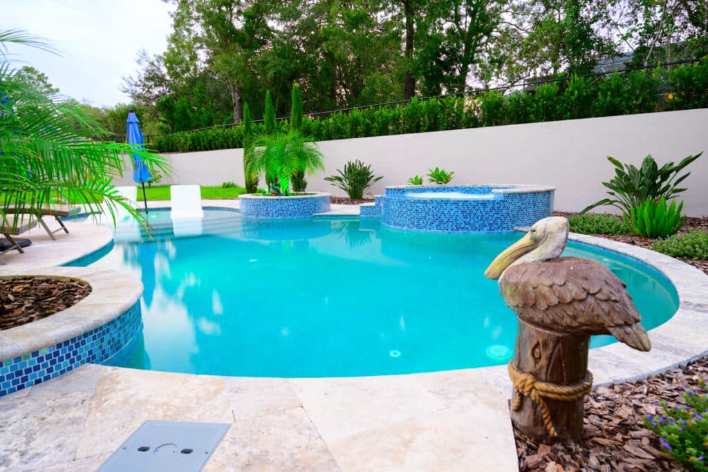 Serene Weeki Wachee backyard pool with lush greenery