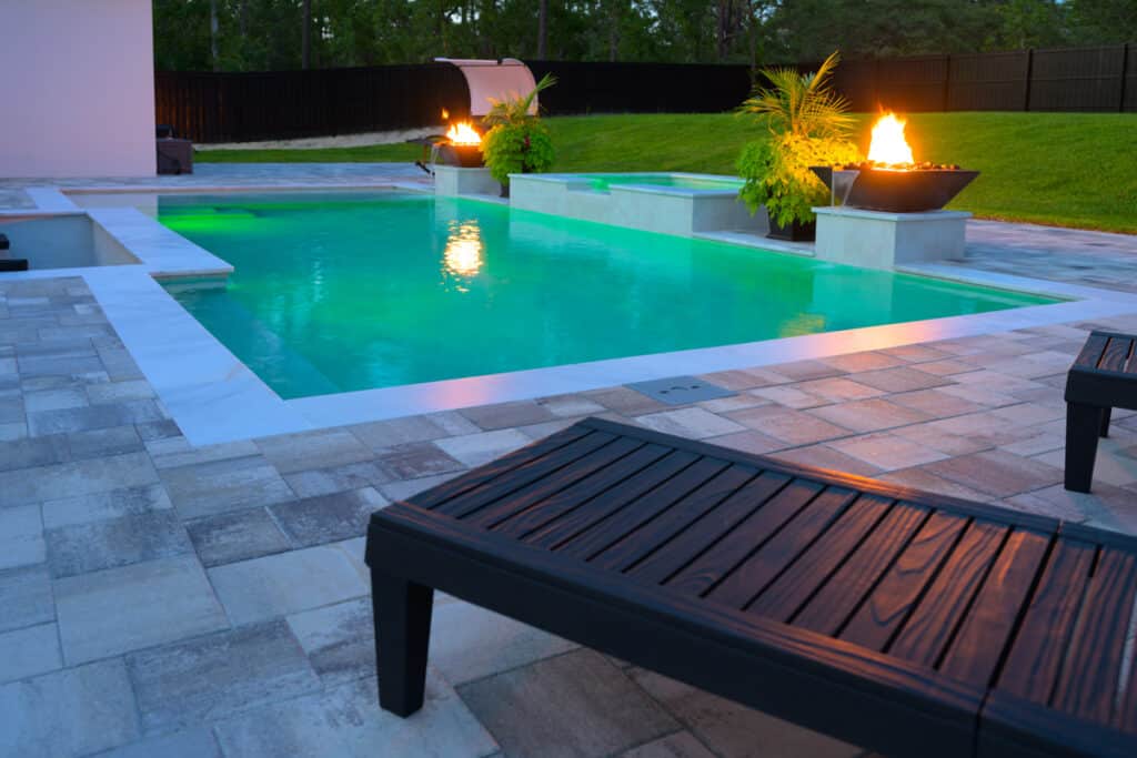 Sleek pool with a fire pit