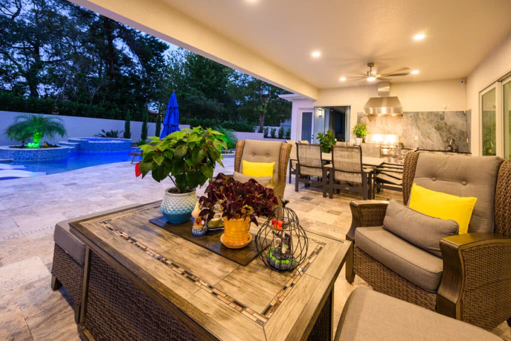 Weeki Wachee backyard featuring a stylish outdoor seating area with a view of a pool