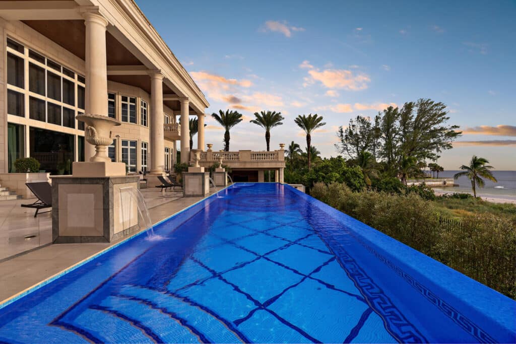 Close-up view of a luxury pool in Tampa with a clean design and inviting water, ideal for backyard relaxation.