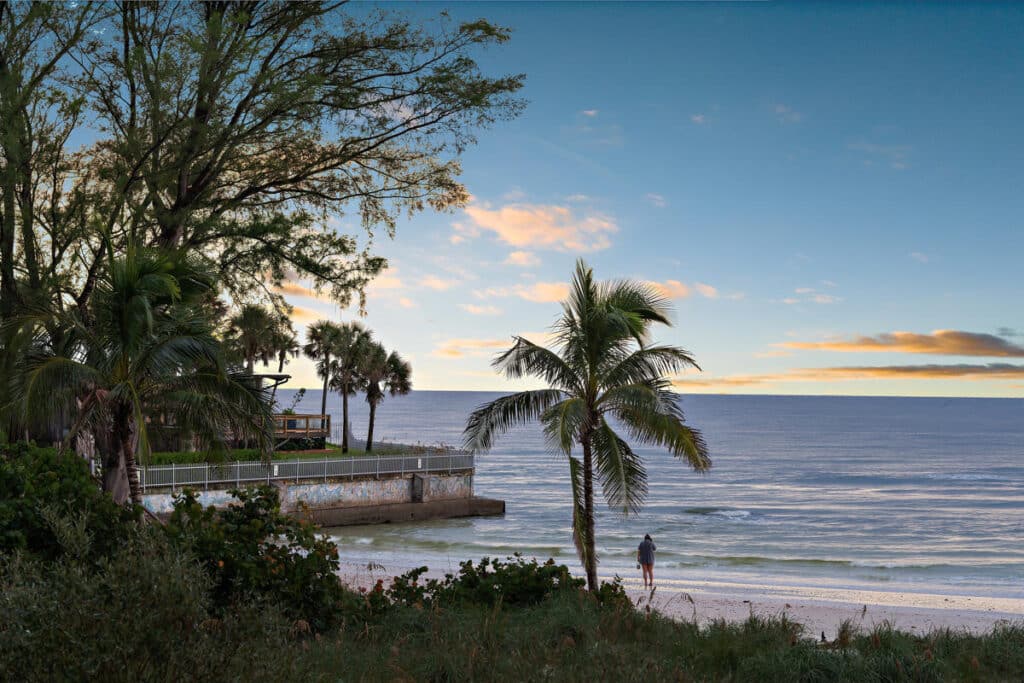 Infinity pool in Tampa with breathtaking ocean views, creating a serene setting perfect for coastal living.